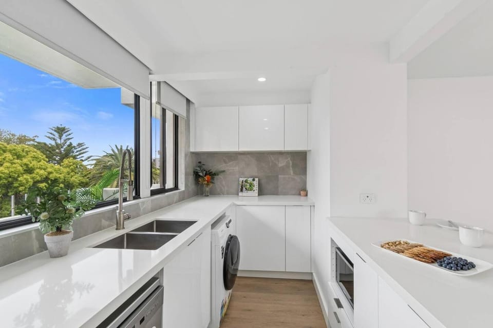 Kitchen or kitchenette, washing machine