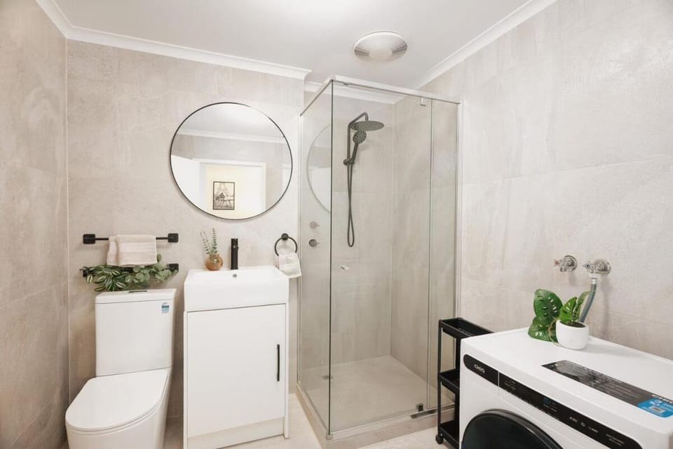 Shower, Toilet, Bathroom, towels, washing machine, dryer