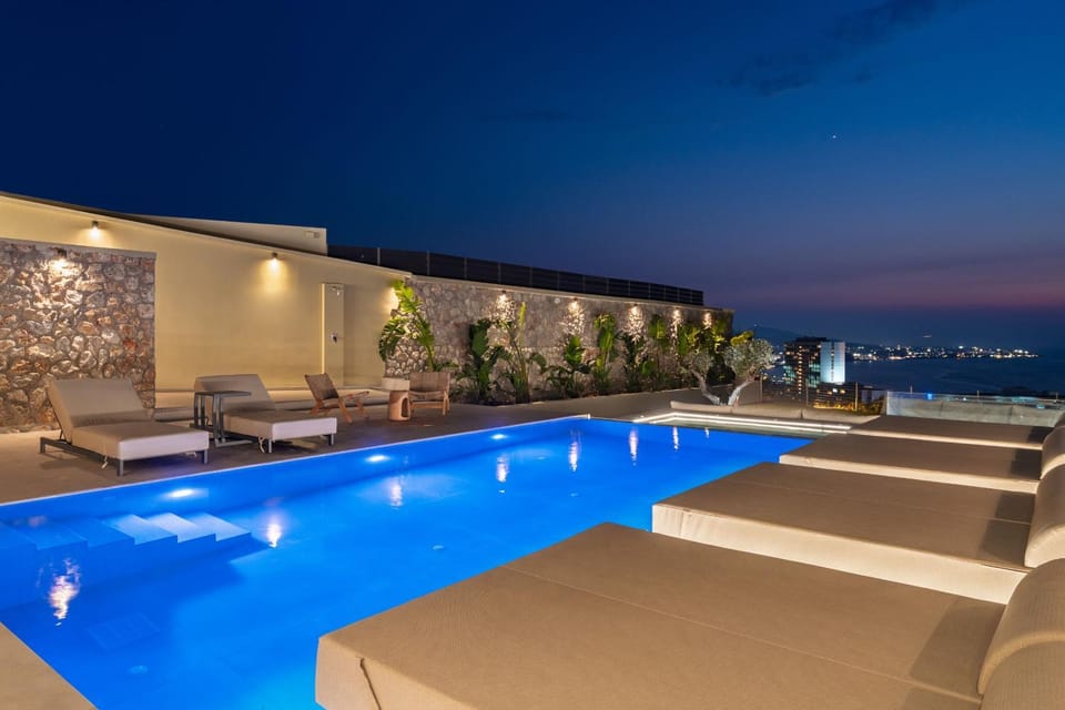 Patio, Night, Natural landscape, Seating area, Pool view, Swimming pool, sunbed