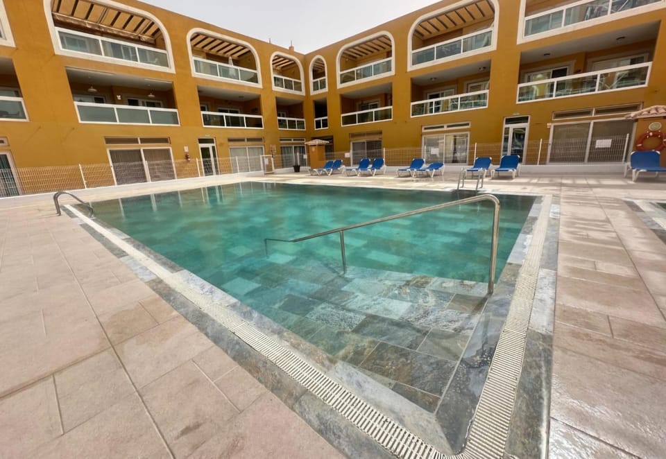 Property building, Pool view, Swimming pool, sunbed
