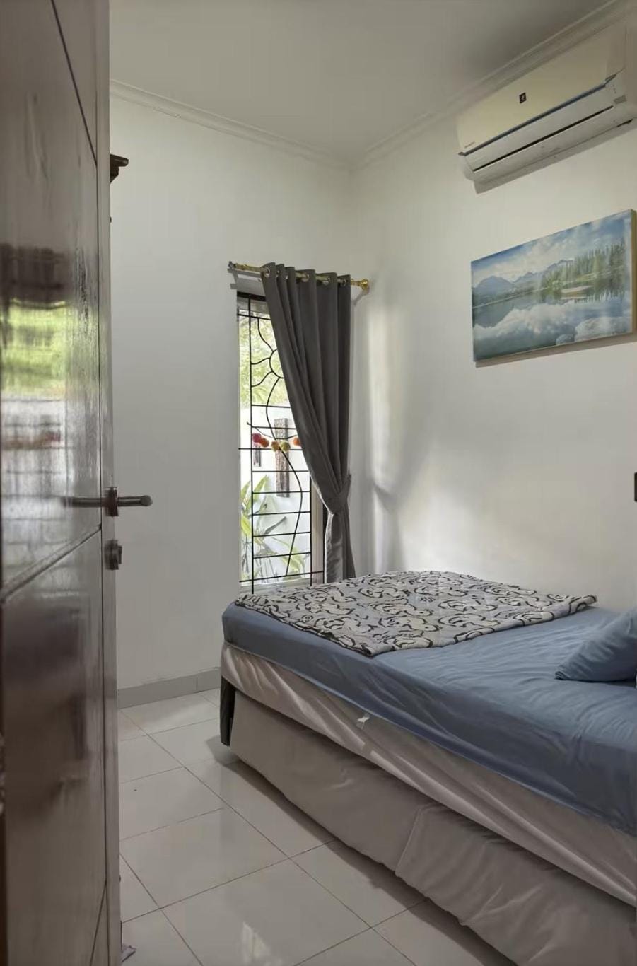 Rumah omie House in Batu Layar