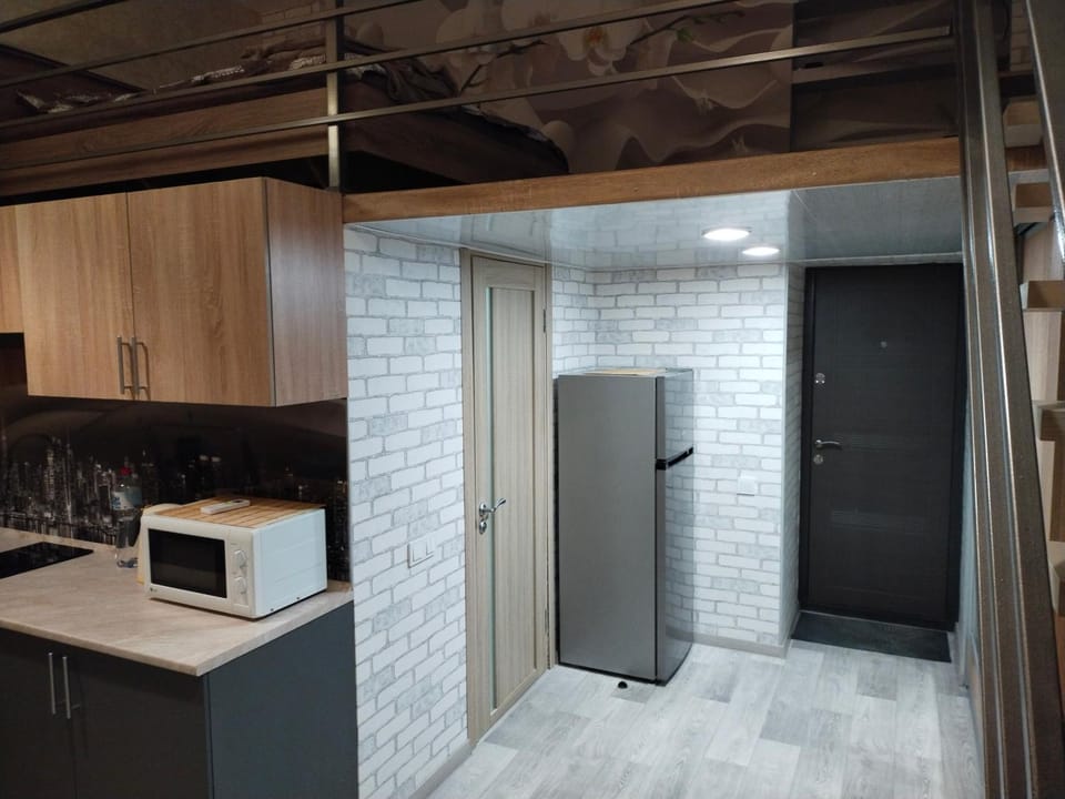 Двухуровневая квартира студия на левом берегу, район старого моста Apartment in Dnipro