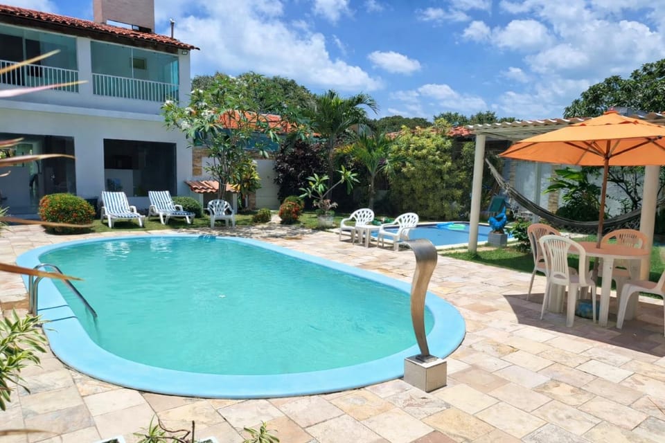 Property building, Patio, Spring, Day, Garden, Garden view, Pool view, Swimming pool, sunbed