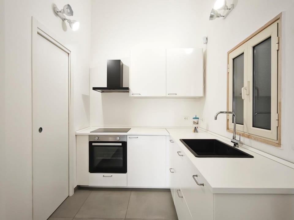 Kitchen or kitchenette, oven, stove