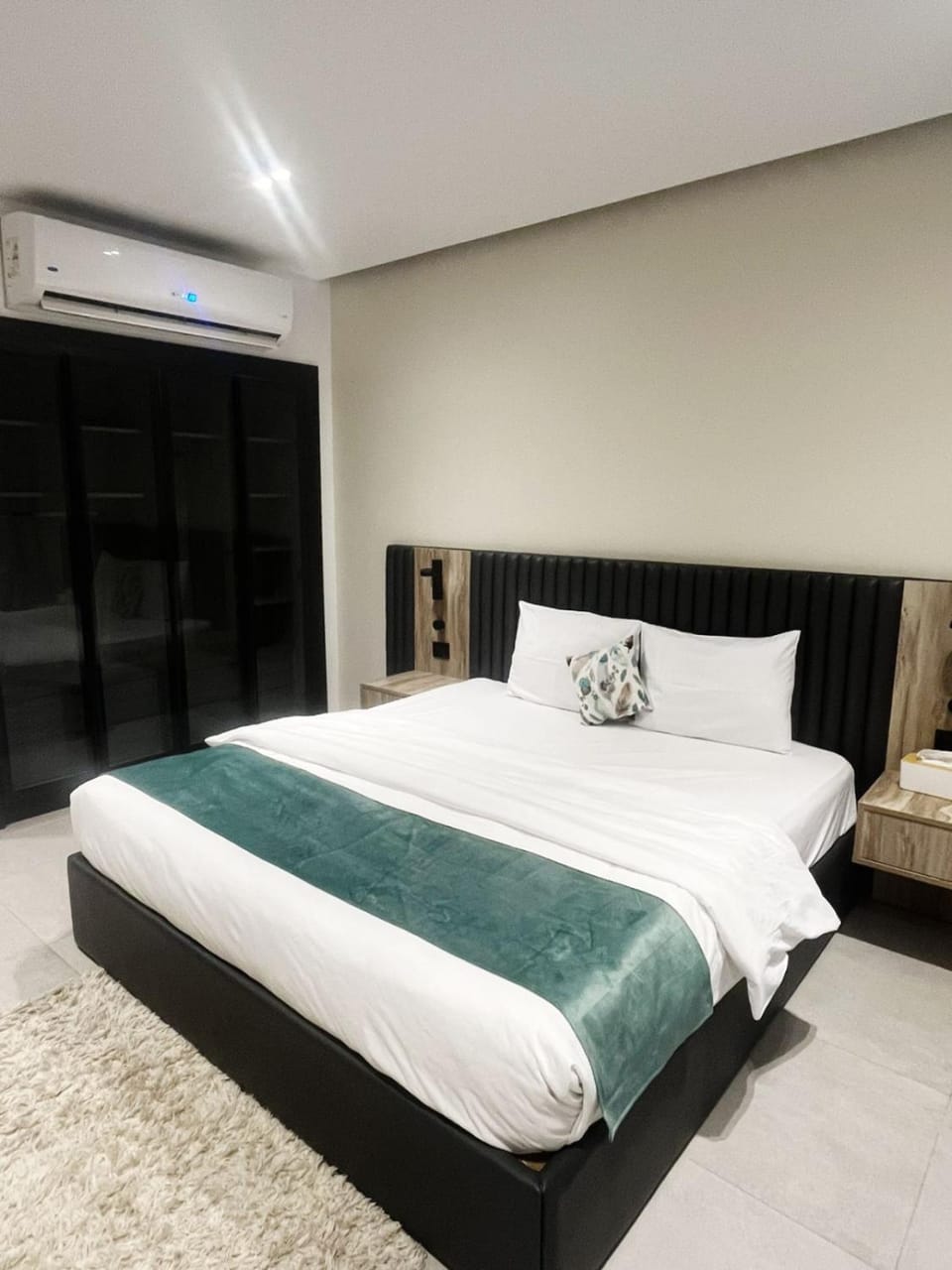 Bed, Photo of the whole room, Bedroom, towels, air conditioner