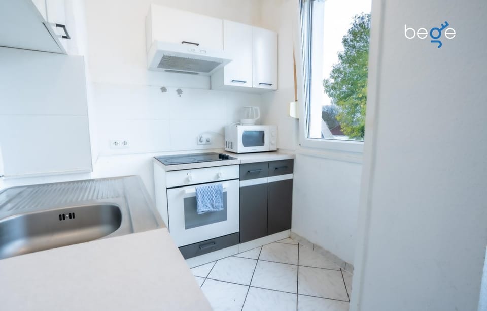 Kitchen or kitchenette, oven, stove, toaster