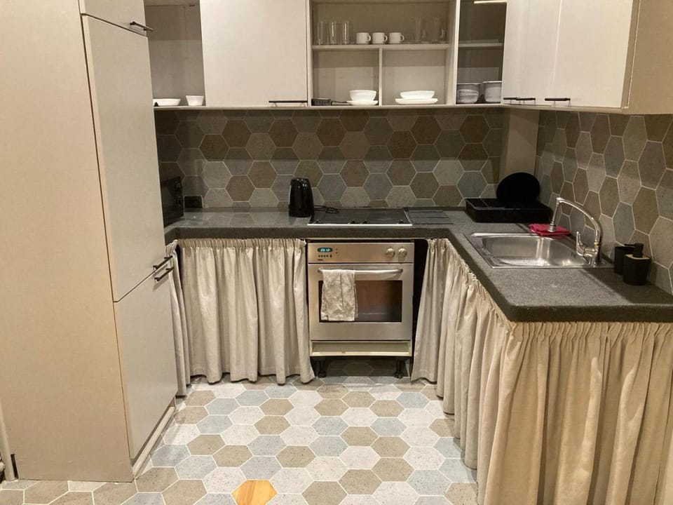 Kitchen or kitchenette, oven, stove