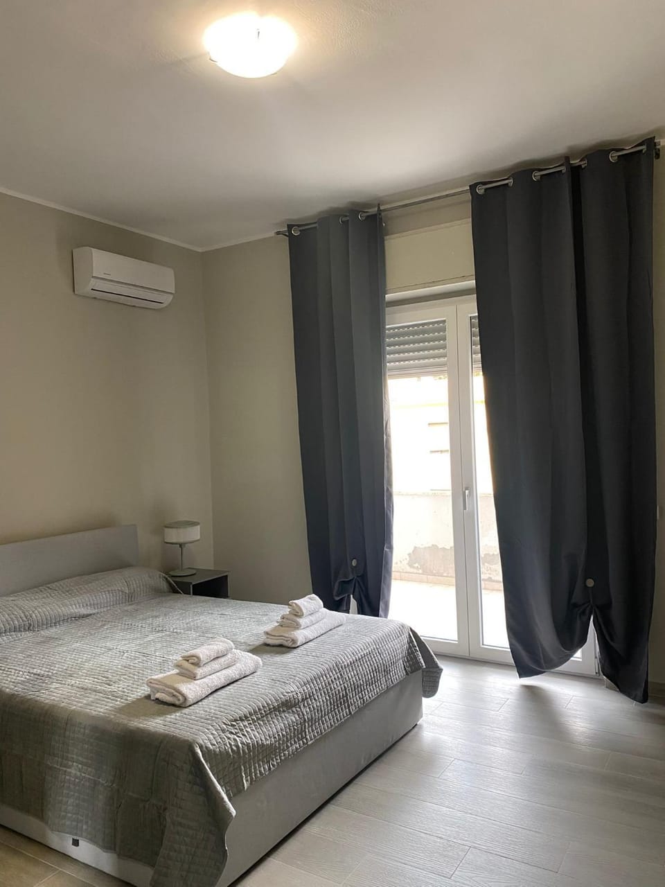 Bed, Photo of the whole room, Bedroom, towels, air conditioner