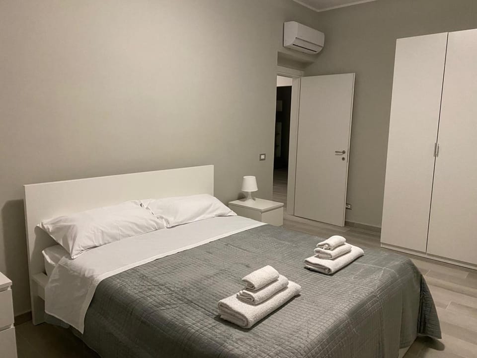 Bed, Photo of the whole room, Bedroom, towels, wardrobe, air conditioner