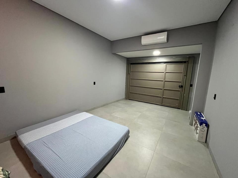 Photo of the whole room, air conditioner