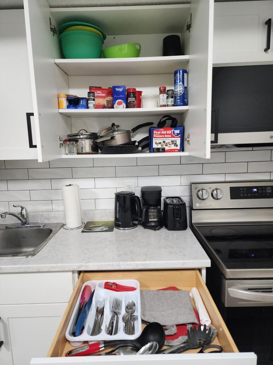 Kitchen or kitchenette, microwave, oven, stove, toaster