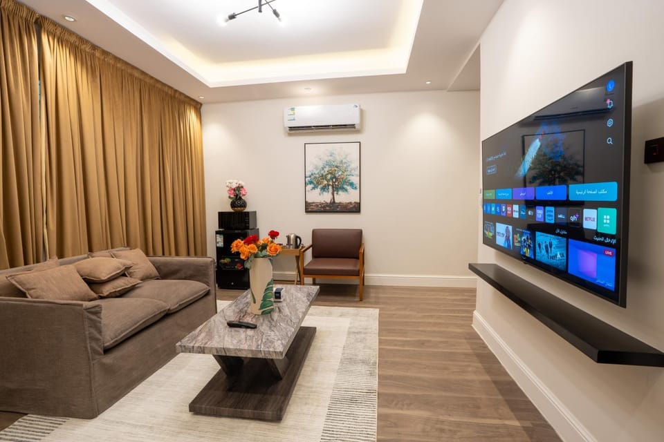 Communal lounge/ TV room, Communal lounge/ TV room, TV and multimedia, Living room, Seating area, Evening entertainment, air conditioner
