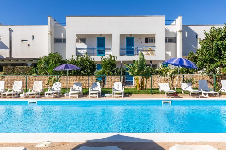 Property building, Living room, Swimming pool
