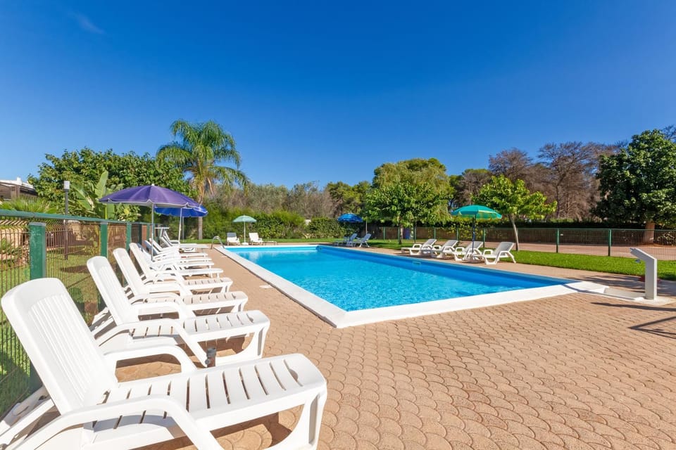 Property building, Living room, Swimming pool