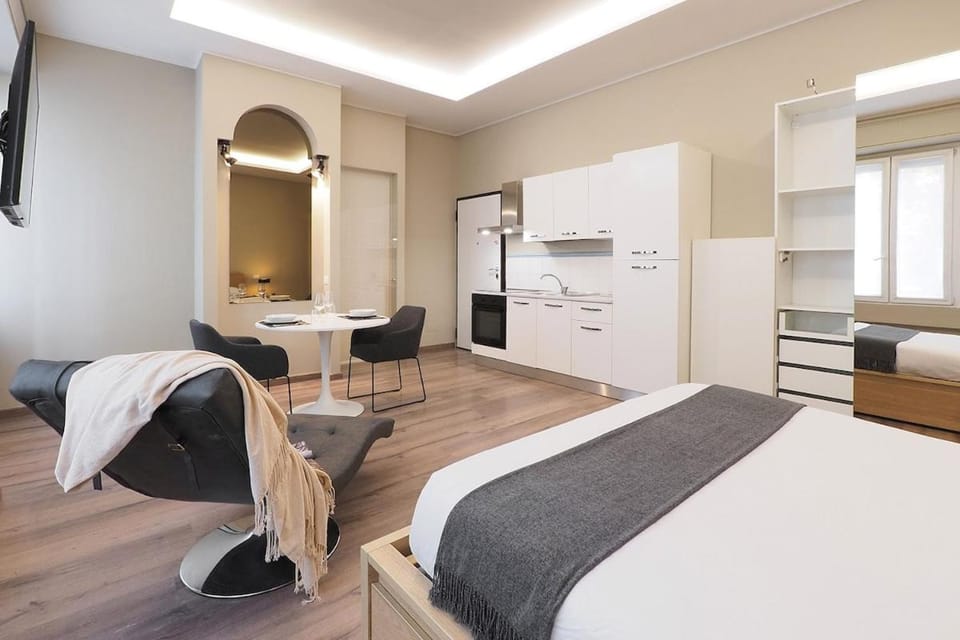 Bed, TV and multimedia, Dining area, oven, wardrobe