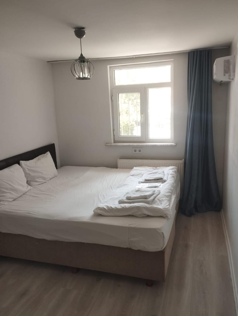 Bed, Photo of the whole room, Bedroom, towels, air conditioner