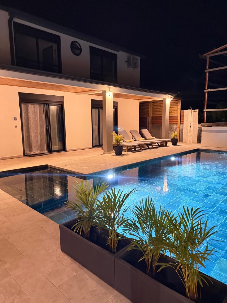 Property building, Patio, Night, Pool view, Swimming pool, sunbed