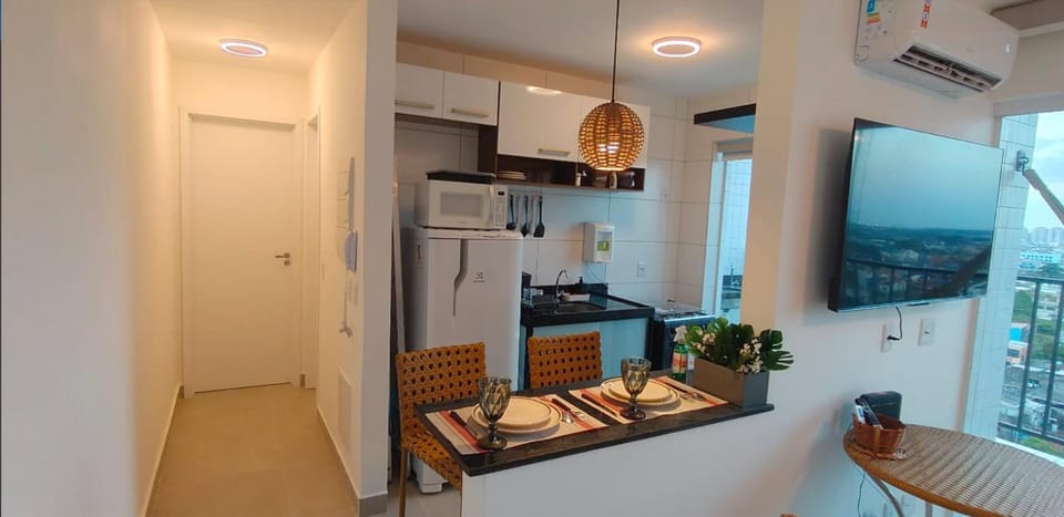 Kitchen or kitchenette, microwave, oven, stove