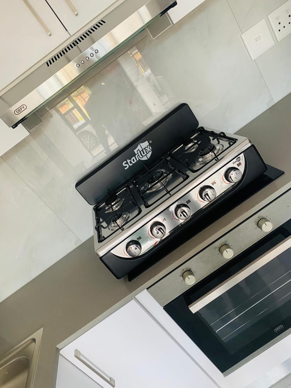 Kitchen or kitchenette, stove