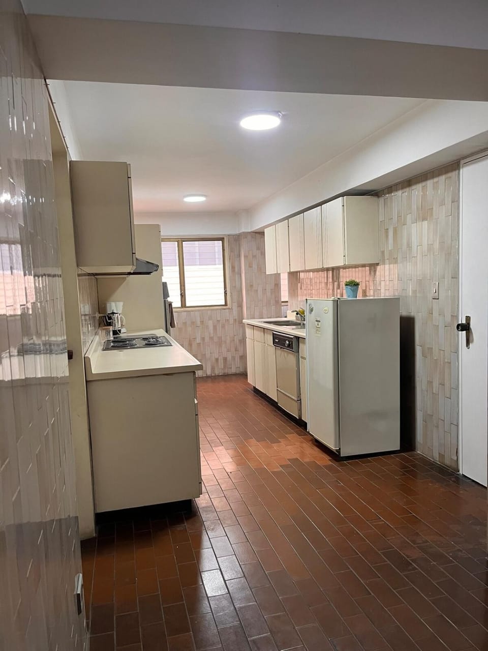 Kitchen or kitchenette, oven
