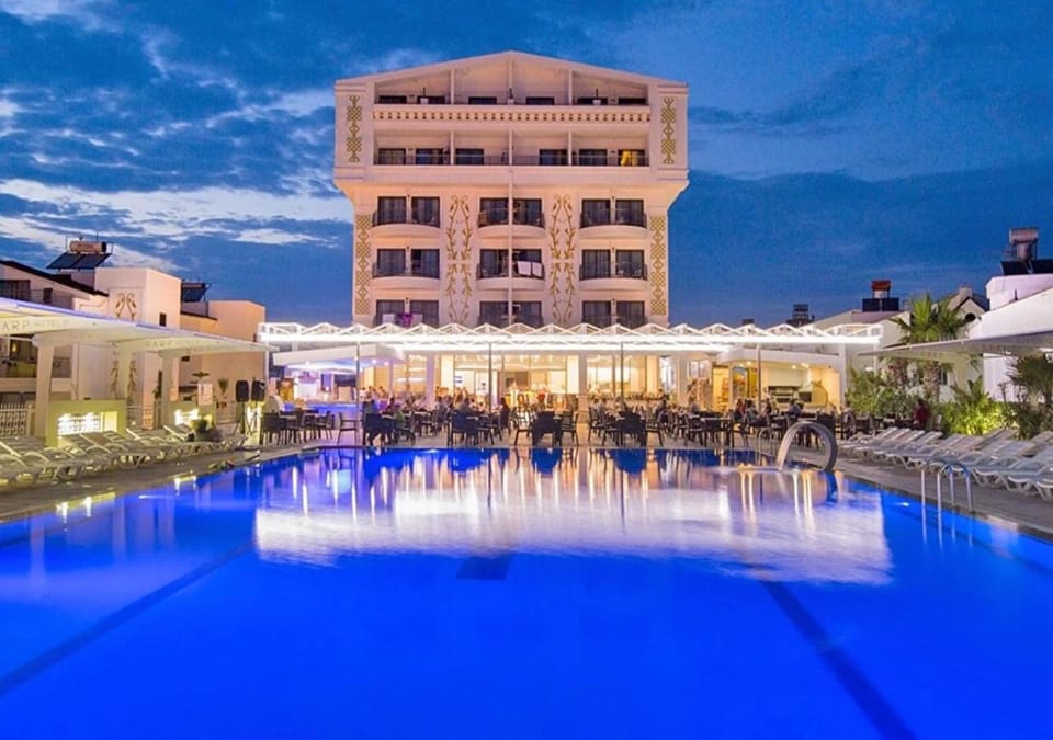 Property building, Night, Pool view, Swimming pool, sunbed