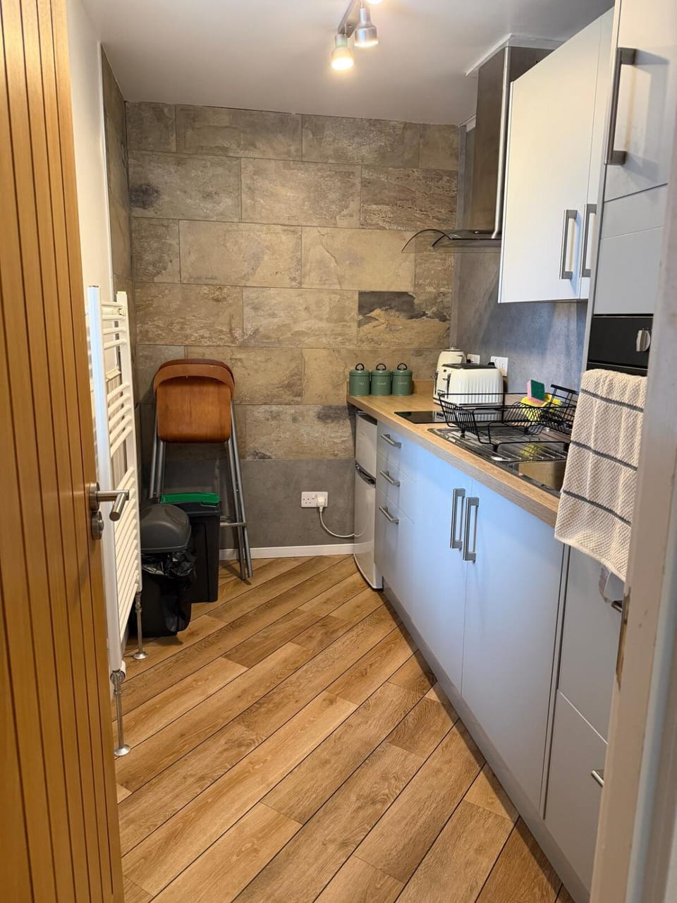 Kitchen or kitchenette, oven, stove, toaster