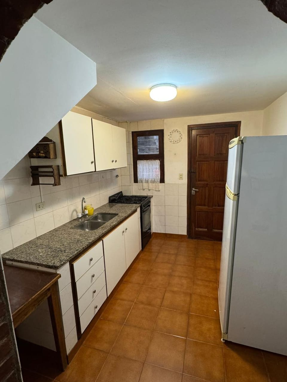 Kitchen or kitchenette, oven, stove