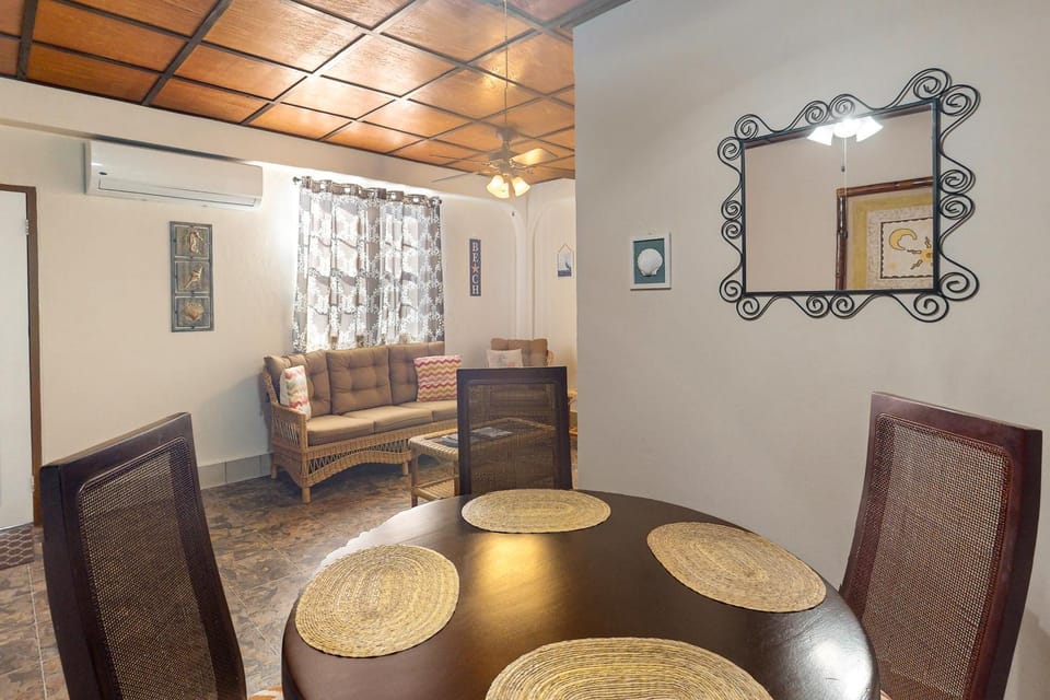 Sunset King Suite at Hummingbird Home Suites Gold Standard Certified Apartment in San Pedro