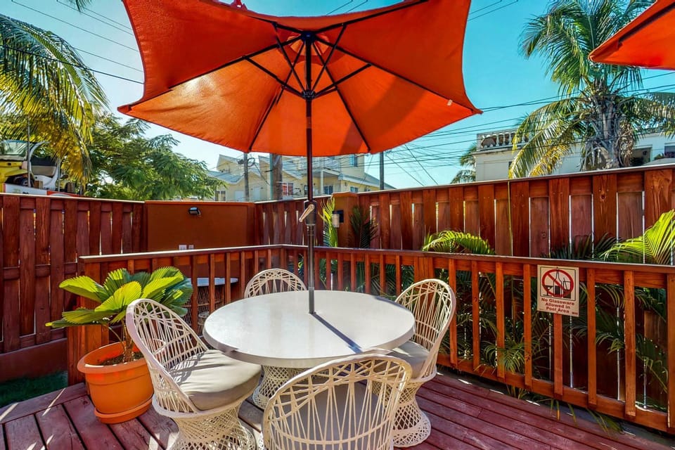 Sunrise King Suite at Hummingbird Home Suites Gold Standard Certified Apartment in San Pedro