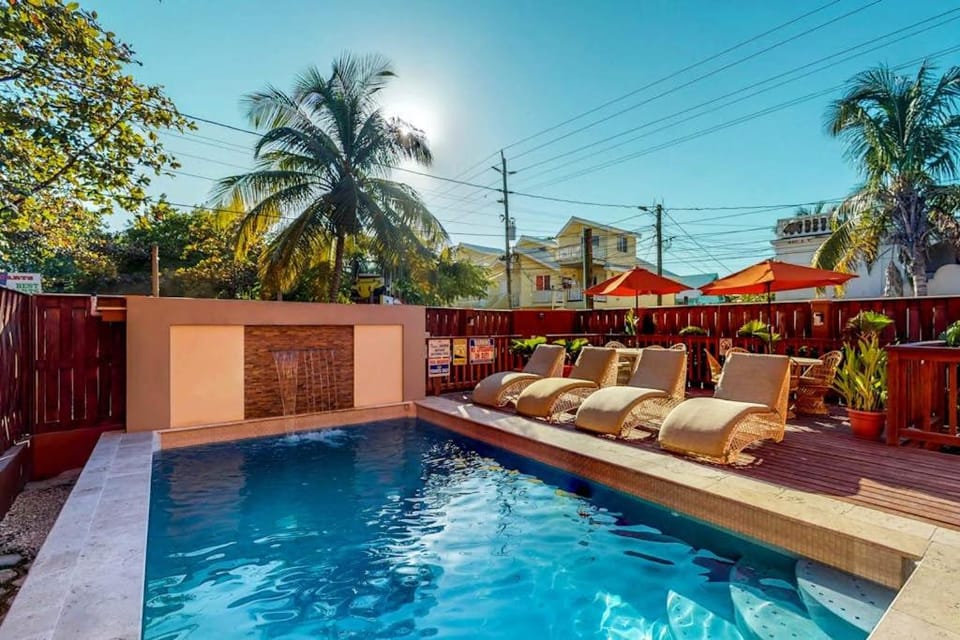 Sunrise King Suite at Hummingbird Home Suites Gold Standard Certified Apartment in San Pedro
