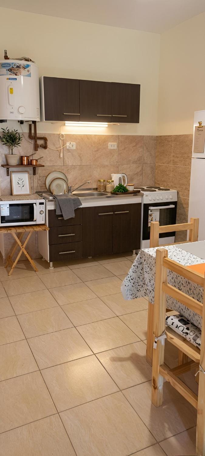 Kitchen or kitchenette, Dining area, oven, stove, toaster