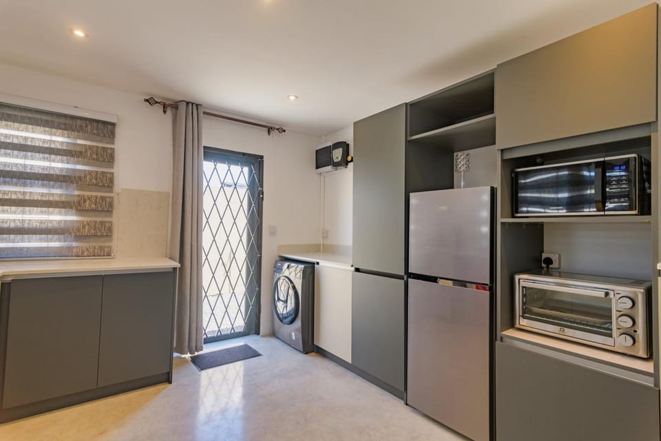 Kitchen or kitchenette, oven, stove