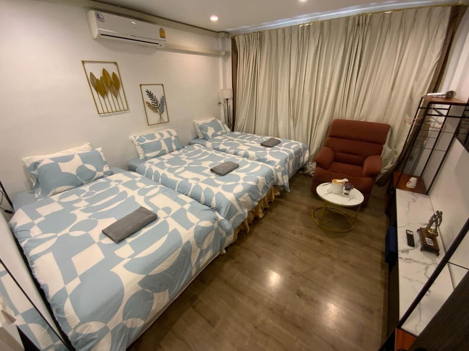 Photo of the whole room, Bedroom, towels, air conditioner
