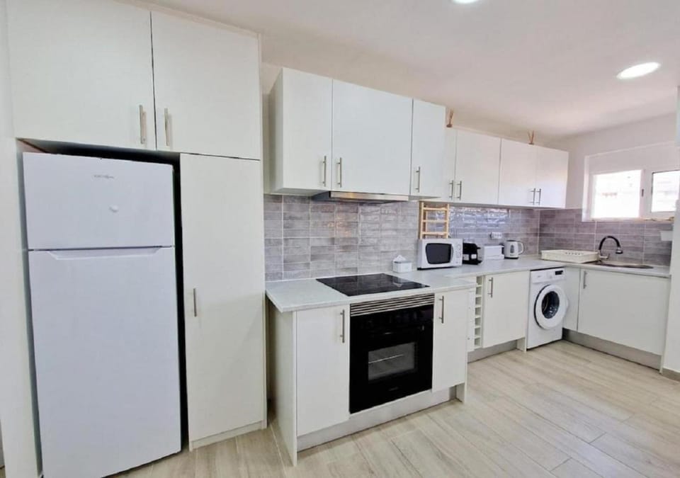 microwave, oven, stove, toaster, washing machine, kitchen