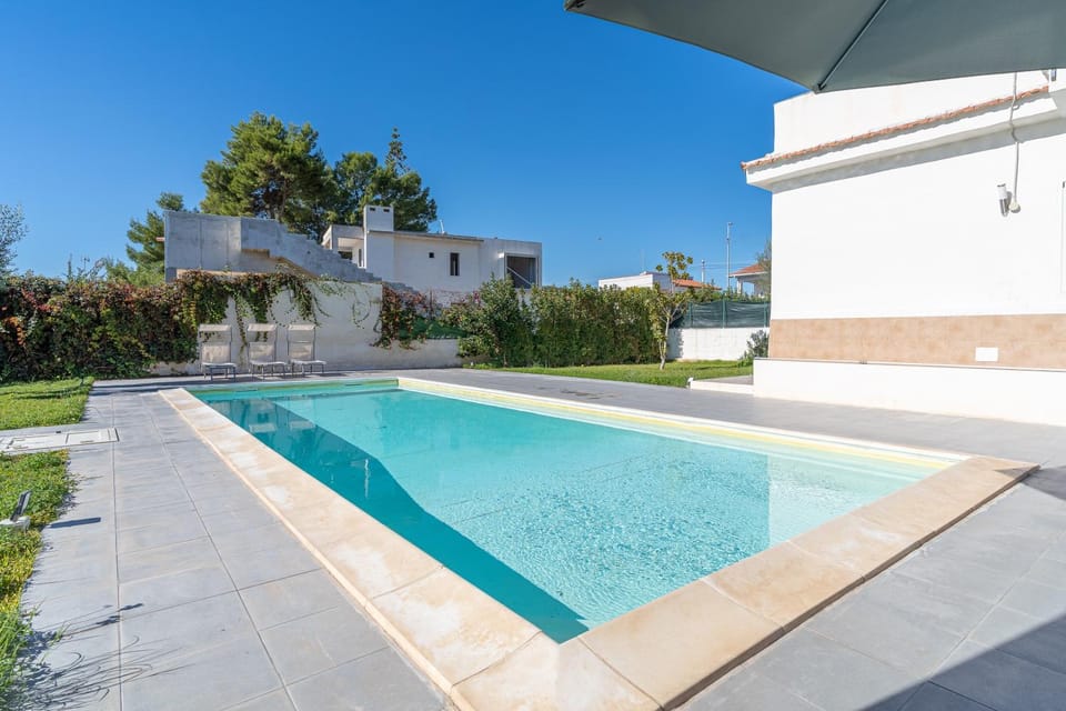 Property building, Living room, Swimming pool