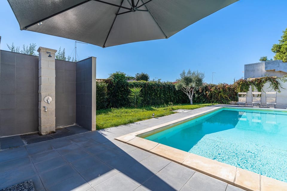Property building, Living room, Swimming pool
