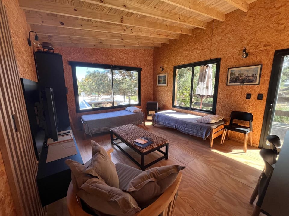 Bed, TV and multimedia, View (from property/room), Living room, Seating area