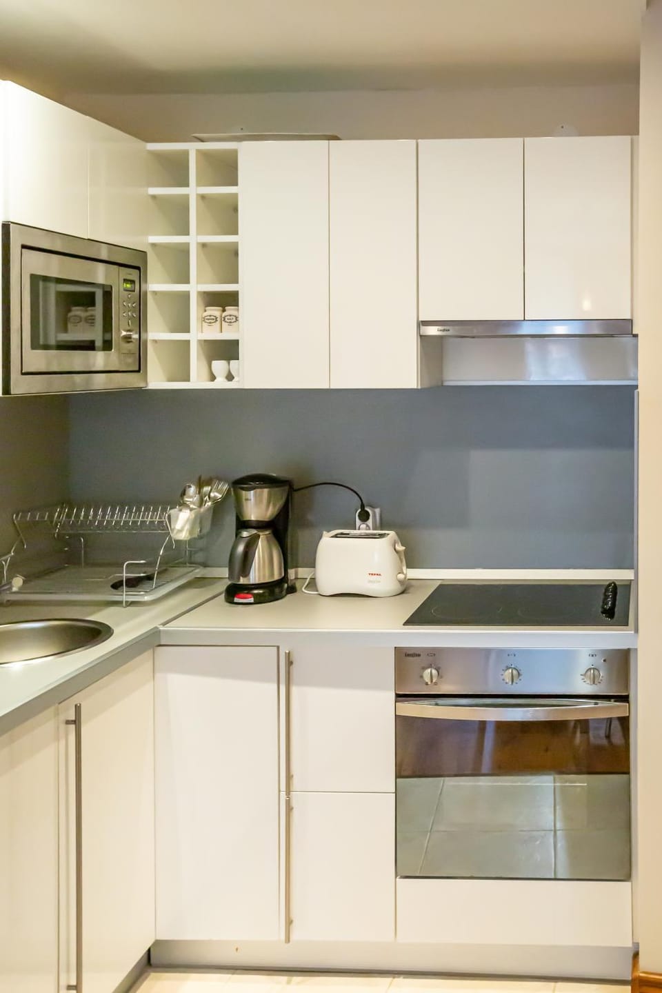 Kitchen or kitchenette, oven, stove