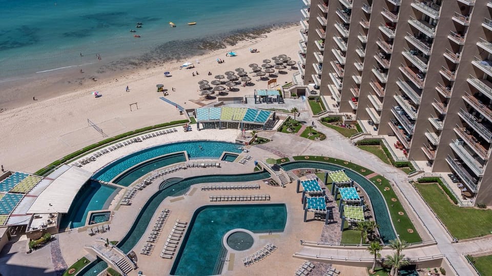Property building, Day, Beach, Pool view, Sea view, Swimming pool, Swimming pool, sunbed