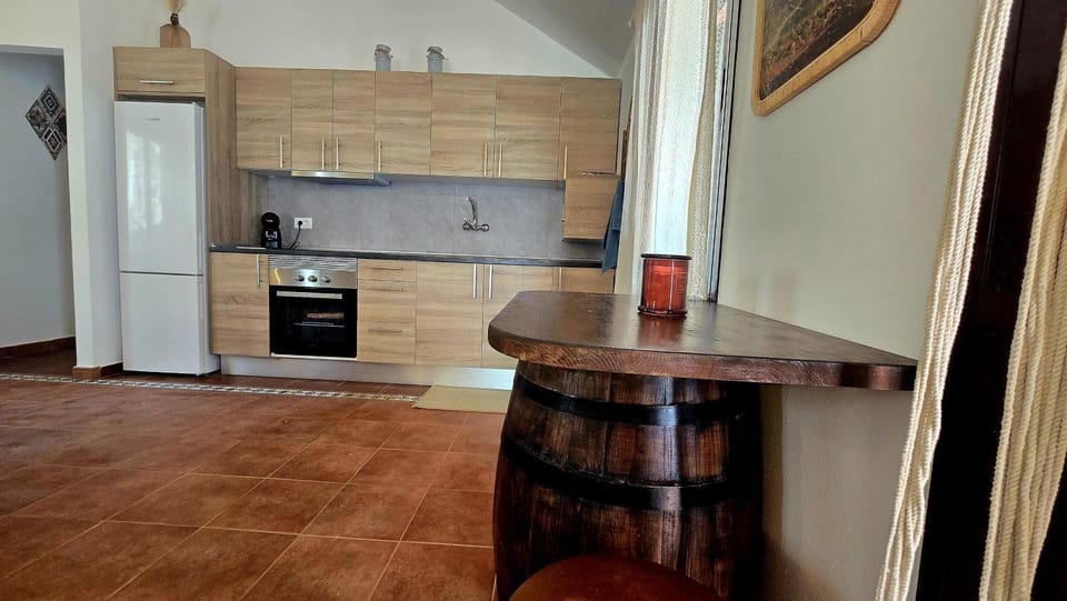 Kitchen or kitchenette, oven, stove, toaster