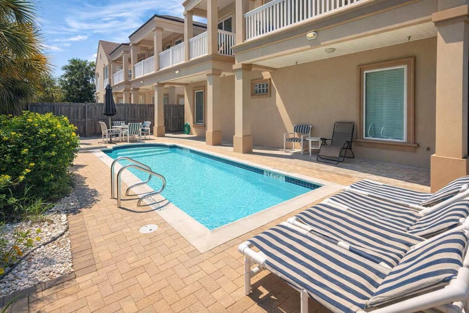 One by forth Block to Beach Ground Floor Pristine Pool Apartment in South Padre Island