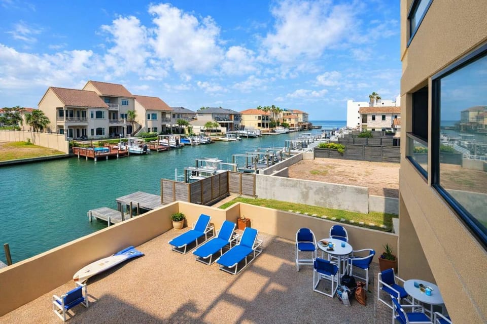 Channel Front with Pool Hot Tub Patio Apartment in South Padre Island