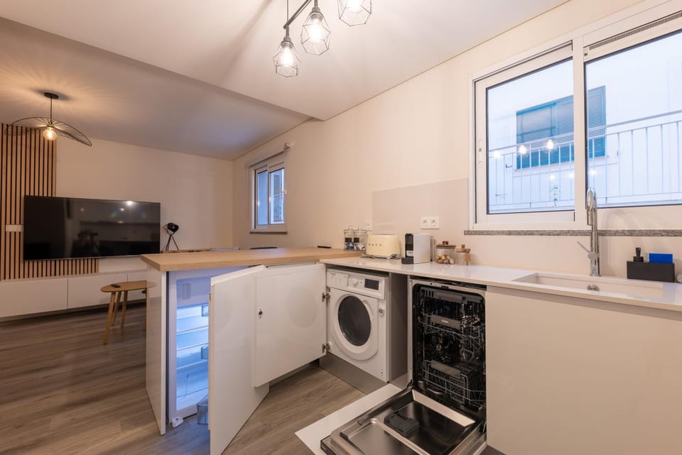 Kitchen or kitchenette, dishwasher, washing machine, dryer
