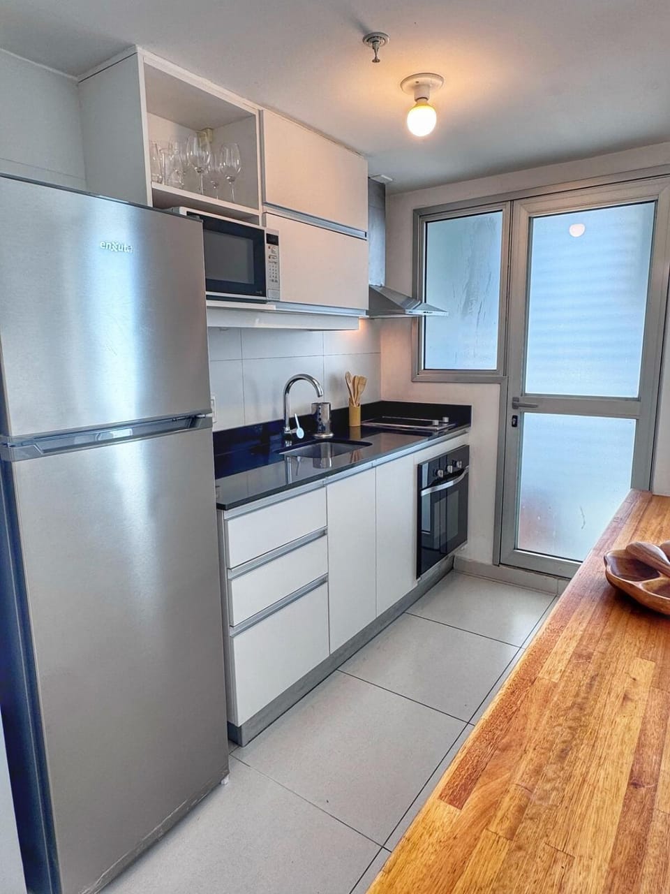 Kitchen or kitchenette, oven, toaster