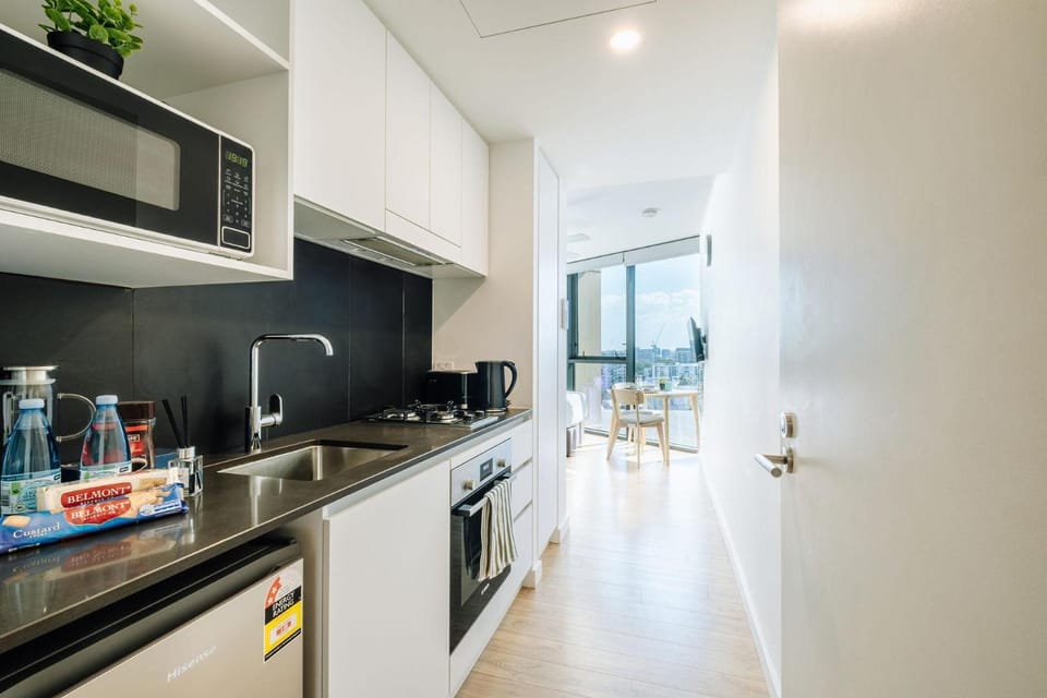 Kitchen or kitchenette, dishwasher, oven, stove, toaster