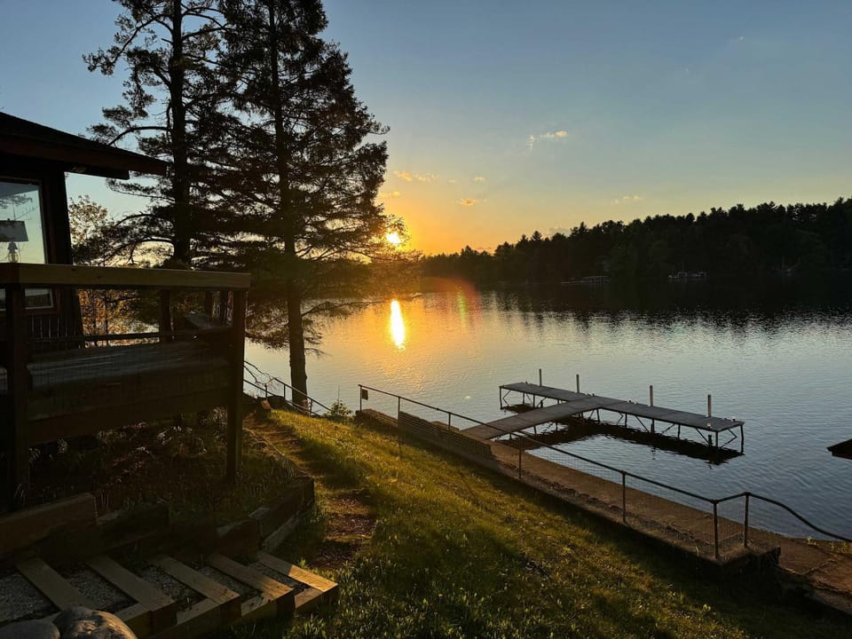 6BR Waterfront Lodge on Round Lake Private Sandy Shoreline Dock Fire Pit Panoramic Views House in Wisconsin