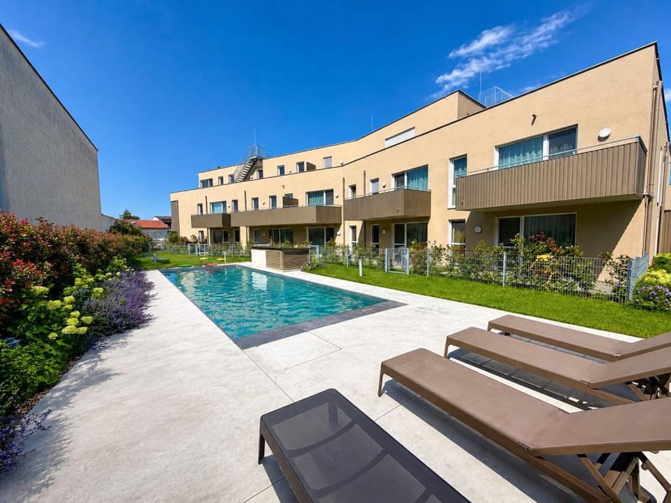 Property building, Day, Pool view, Swimming pool