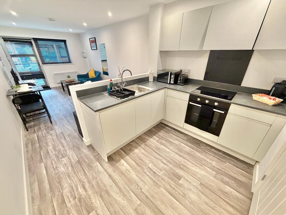 Kitchen or kitchenette, oven, stove, toaster