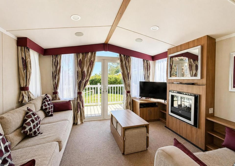 8 Berth Caravan With Front Decking At Haven Orchards In Essex Ref 15010Kq House in Tendring District