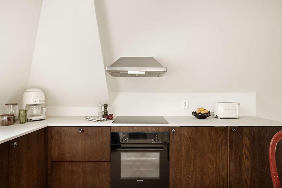 Kitchen or kitchenette, oven, stove, toaster